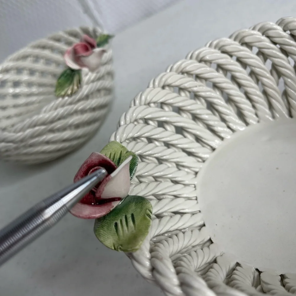 Made in Italy Italian 2 small porcelain woven baskets with flowers atop baskets